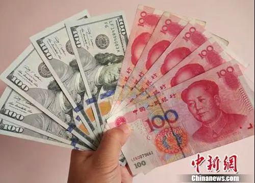 资料图：人民币和美元。<a target='_blank' href='http://www.chinanews.com/' >中新网</a>记者 李金磊 摄
